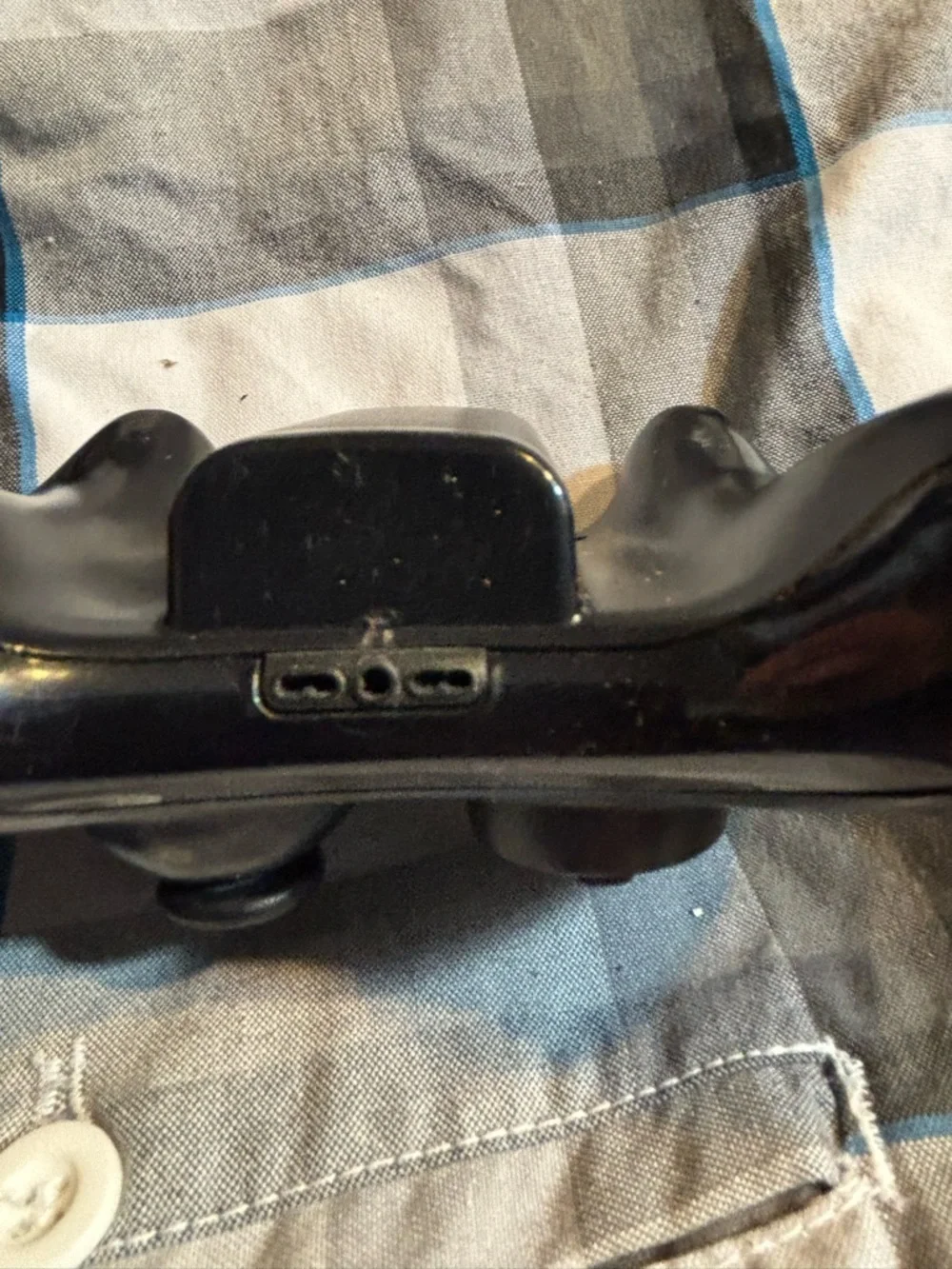 Microsoft Black Xbox 360 Wireless Controller with Colored Face Buttons.